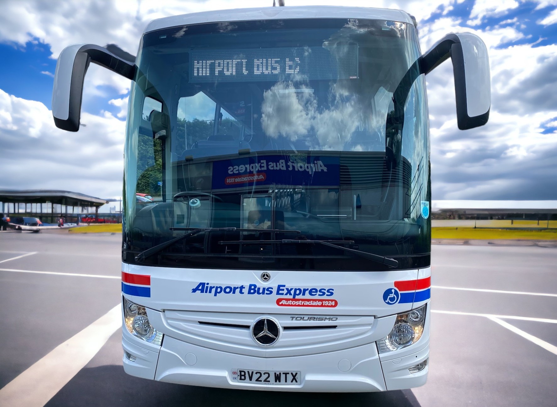 Head on photo of front of Airport Bus Express coach